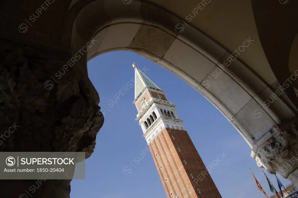 Italy, Veneto, Venice, The Campanile In Piazza San Marco Seen Through An Arch Below The Doges Palace