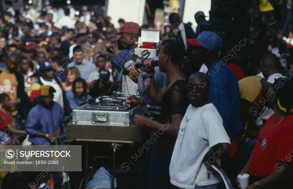 England, London, Mixed Crowd Listening To Sound System Dj And Crew At The Notting Hill Carnival.