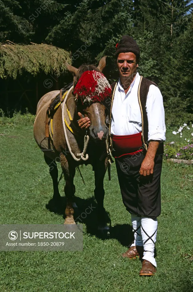 Bulgaria, Chalin Valog, 'Man In National Costume Standing With Horse. Pirin Mountain, Near Bansko,. '