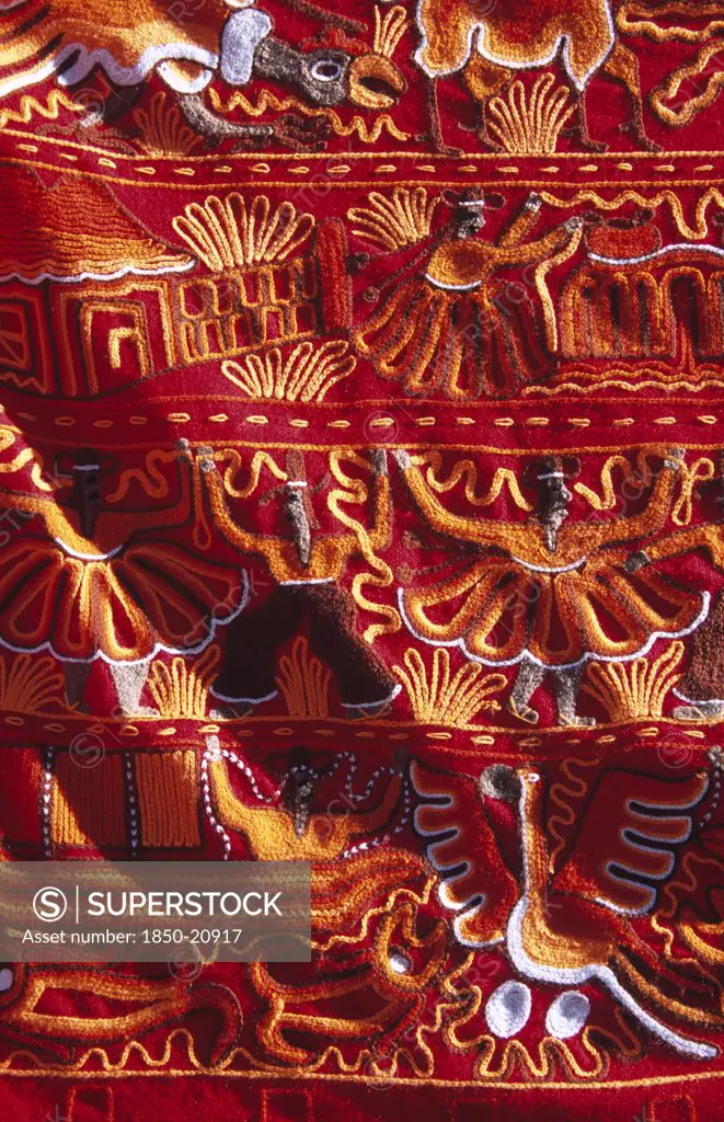 Peru, Near Cusco, Ollantaytambo, 'Colourful Patterned Embroidered Cloth In The Market, Ollantaytambo, Sacred Valley Of The Incas.'