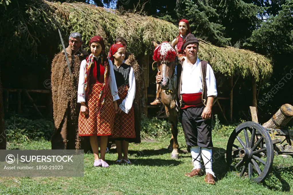 Bulgaria, Pirin Mountain, Chalin Valog, Girls Dressed In Bulgarian National Costume And Men Dressed As Hunters.