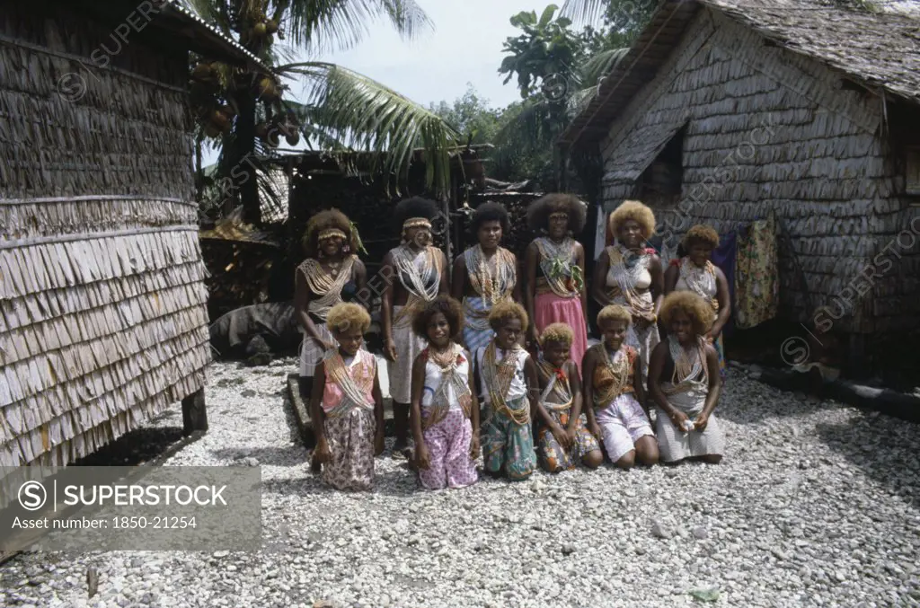 Pacific Islands, Melanesia, Solomon Islands, 'Malaita Province, Lau Lagoon, Foueda Island.  Group Portrait Of Wedding Dancers Wearing Multi-Strand Shell And Coral Necklaces.'