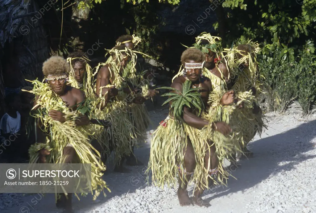 Pacific Islands, Melanesia, Solomon Islands, 'Malaita Province, Lau Lagoon, Foueda Island.  Men In Traditional Costume Performing Dance.'