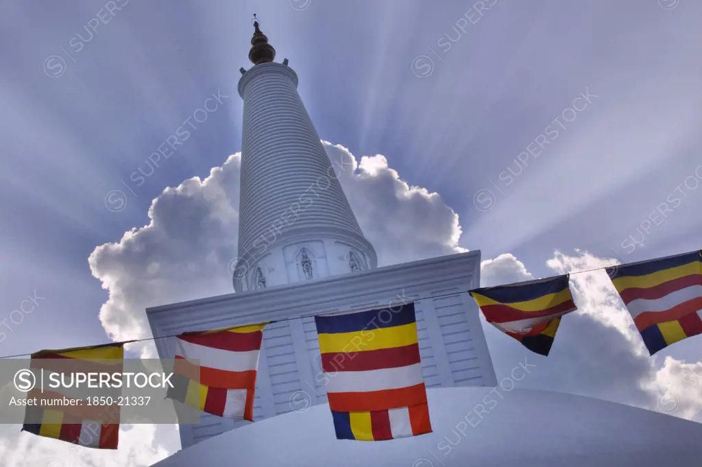 Sri Lanka, Anuradhapura, Prayer Flags Hanging In Front Of Ruvanvelisaya Dagoba.