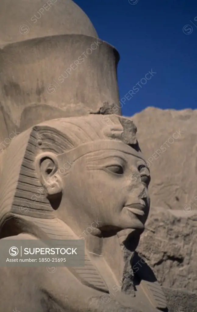 Egypt, Nile Valley, Thebes, 'Deir El-Bahri, Hatshepsut Mortuary Temple. Side Profile Of Defaced Statue Of Female Pharaoh Hatshepsut, Depicted In Masculine Form. Her Image Was Defaced After Her Demise By Pharaoh Tuthmosis Iii, For Whom She Acted As Regent.'
