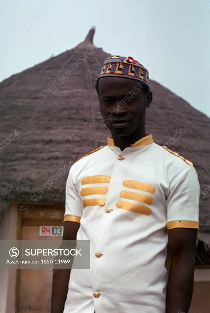 Nigeria, People, Three-Quarter Portrait Of Young Man Working For Hotel.
