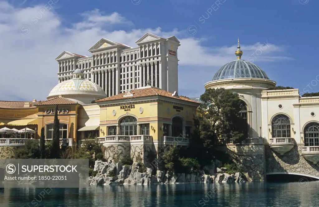 Usa, Nevada, Las Vegas, 'Caesars Palace Hotel And Casino, Across Lake In Front Of The Bellagio.'