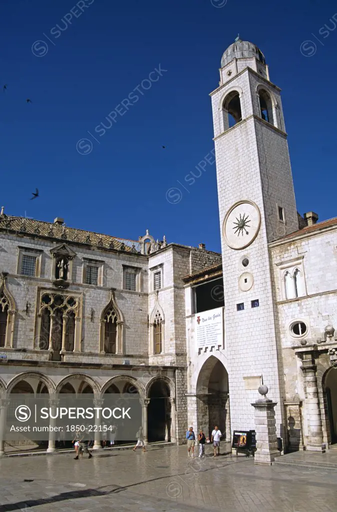 Croatia, Dalmatian Coast, Dubrovnik, 'Bell Tower And Sponza Palace, Luza Square, Stradun. Former Yugoslavia'
