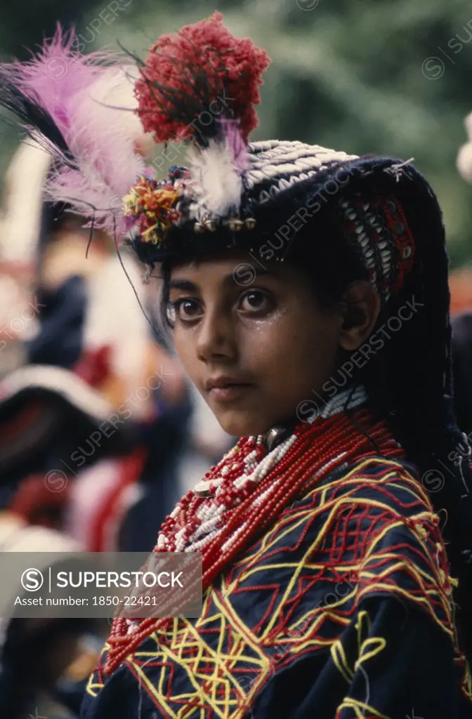 Pakistan, North West Frontier, Bumburet, Young Kalash Girl Wearing Traditional Dress At The Chilimjusht Festival In Bumburet