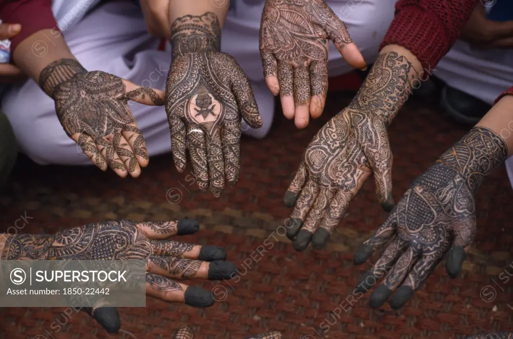 India, Rajasthan, Nawalgarh, Detail Of A Group Of Hands With Various Henna Designs In The Mehndi Competition At The Shekhawati Festival