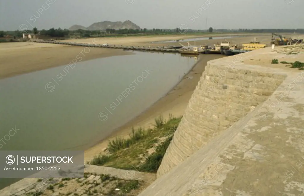China, Yellow River, View Over River And Dykes After Upstream Irrigation Leaving Only Shallow Water.