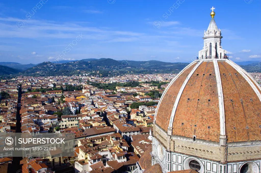 Italy, Tuscany, Florence, 'The Dome Of The Cathedral Of Santa Maria Del Fiore, The Duomo, By Brunelleschi With Tourists On The Viewing Platform Looking Over The City Towards The Surrounding Hills'