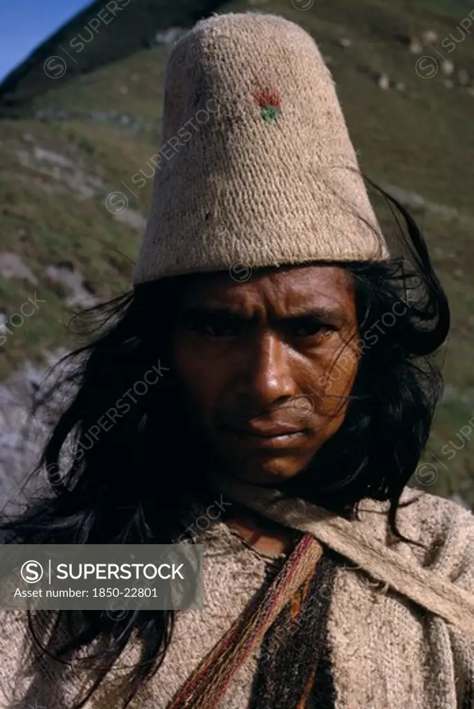 Colombia, Sierra Nevada De Santa Marta, Ika, Portrait Of Ika Man In Traditional Dress.Helmet Made From Woven Fique Cactus Fibre  Manta Cloak From Woven Wool&Cotton  Arhuaco Aruaco Indigenous Tribe American Classic Classical Colombian Colombia Hispanic Historical Indegent Latin America Latino Male Men Guy Older South America  Arhuaco Aruaco Indigenous Tribe American Classic Classical Colombian Columbia Hispanic Historical Indegent Latin America Latino Male Men Guy Older South America History Male
