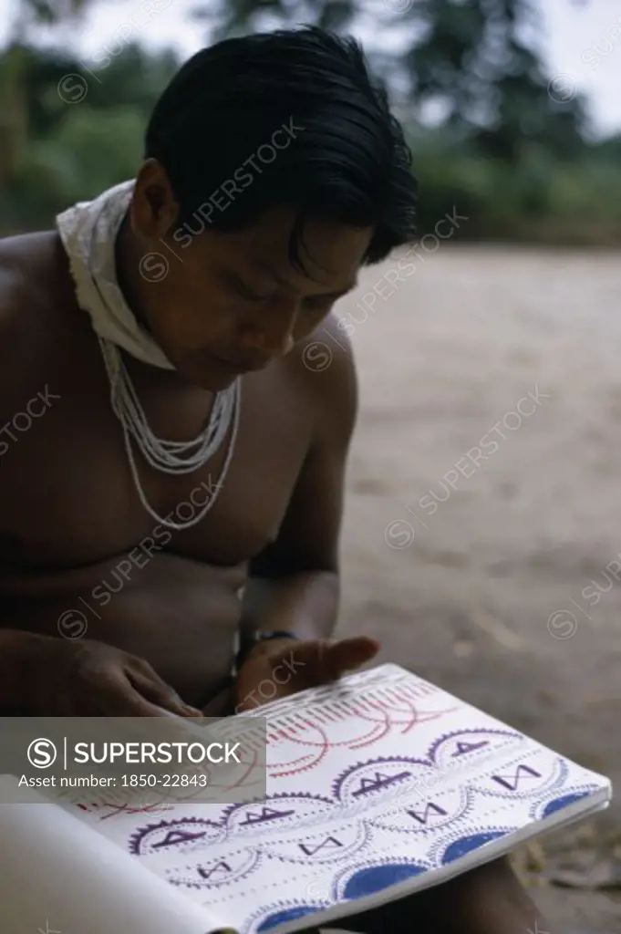 Colombia, North West Amazon, Tukano Indigenous People, Young Barasana Shaman Pacico Draws For Anthropologist Stephen Hugh-Jones The Colour Visions He Sees When Under The Influence Of Hallucinogenic Drug Yage. Tukano Sedentary Indian Tribe North Western Amazonia Western Influence American Colombian Colored Columbia Hispanic Indegent Latin America Latino South America Tukano Turkano One Individual Solo Lone Solitary
