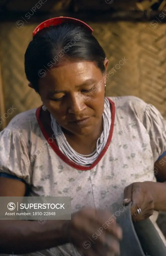 Colombia, North West Amazon, Tukano Indigenous People, Barasana Woman  Paulina  The Headman Bosco'S Sister  Making Clay Pot.Her Death Has Marked The Virtual Extinction Of Pottery-Making Amongst The Barasana. Tukano Sedentary Indian Tribe North Western Amazonia American Colombian Columbia Female Women Girl Lady Hispanic Indegent Latin America Latino South America Tukano Female Woman Girl Lady One Individual Solo Lone Solitary