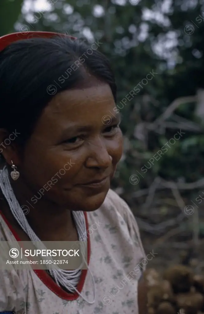 Colombia, North West Amazon, Tukano Indigenous People, 'Head And Shoulders Portrait Of Barasana Woman  Paulina, Bosco'S Sister  Wearing Multi-Strand White Glass Bead Necklace And Silver Ear-Rings. Tukano Sedentary Indian Tribe North Western Amazonia American Colombian Columbia Female Women Girl Lady Hispanic Indegent Latin America Latino South America Tukano '
