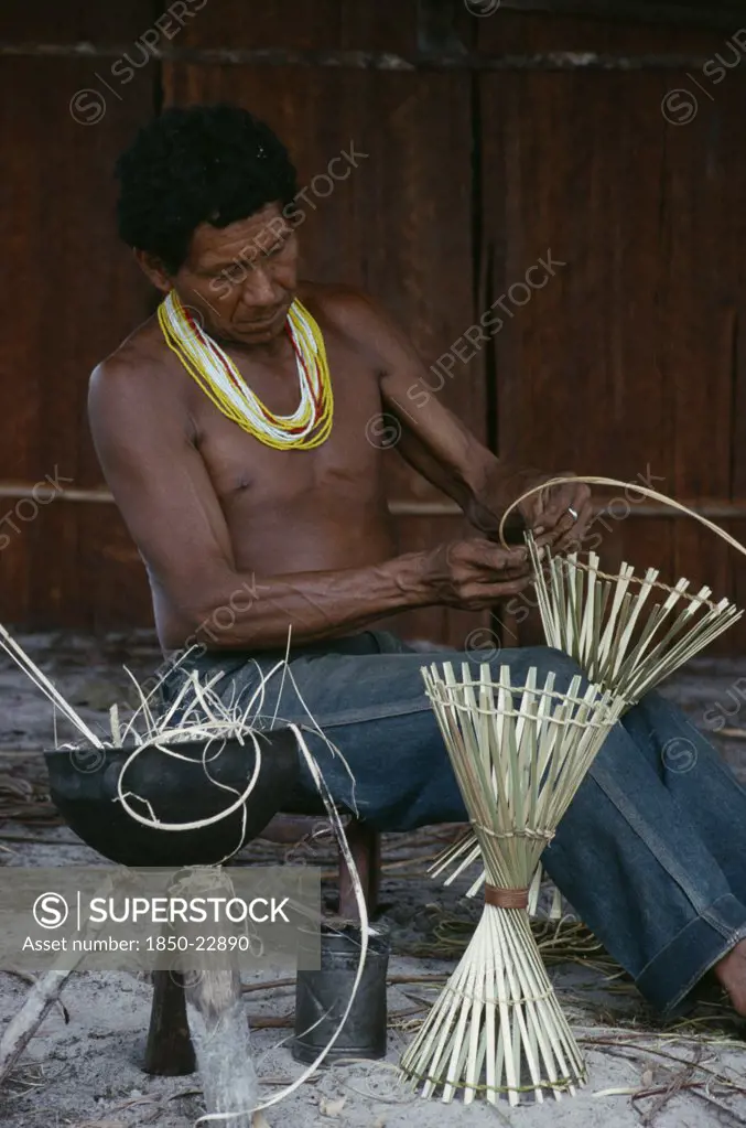 Colombia, North West Amazon, Tukano Indigenous People, Makuna Man Making Cane Cooking Pot Stands. Tukano  Makuna Indian North Western Amazonia American Colombian Columbia Hispanic Indegent Latin America Latino Male Men Guy South America Tukano