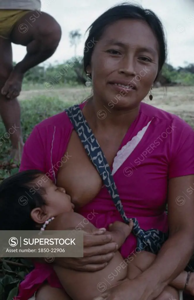 Colombia, North West Amazon, Tukano Indigenous People, Makuna Mother Breastfeeding Baby. Tukano  Makuna Indian North Western Amazonia Family American Babies Colombian Columbia Hispanic Indegent Kids Latin America Latino Mum South America Tukano
