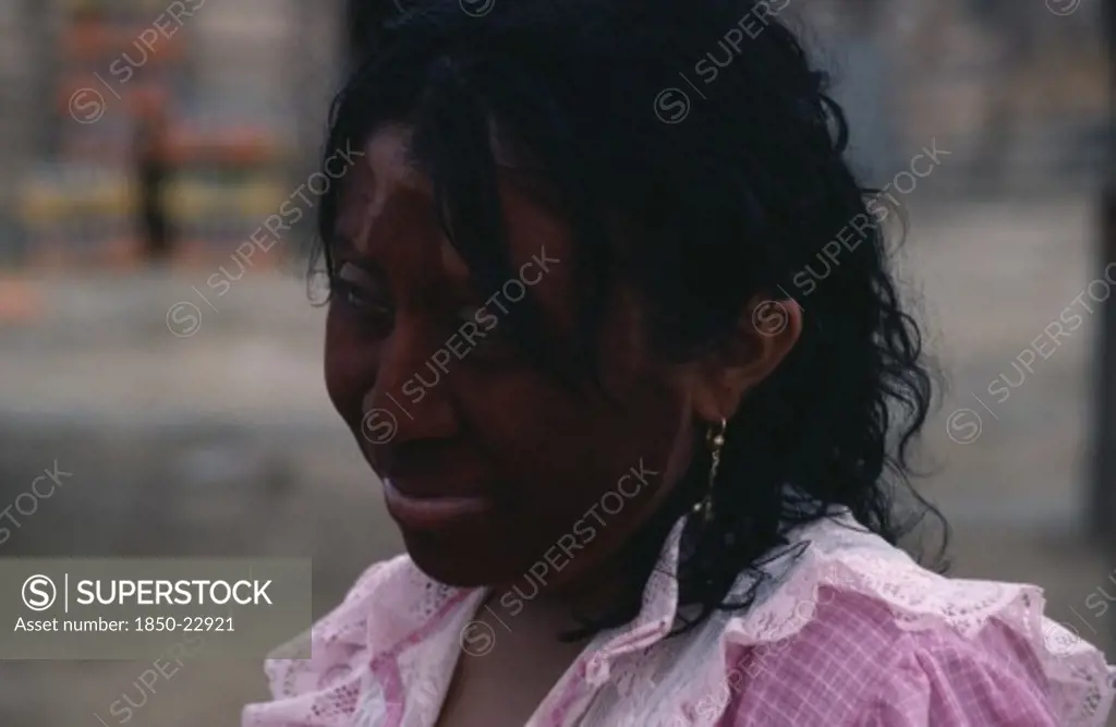Colombia, Guajira Peninsula, Guajiro Indians, Head And Shoulders Portrait Of Guajira Woman With Face Painted Dark Red (Achiote Fruit) And Black With A Mixture Of Goat'S Fat And Charcoal As Protection Against Sun And Strong Sea Winds. Wayu Wayuu Guajiro Amerindian Arawakan Colombia-Venezuela Border