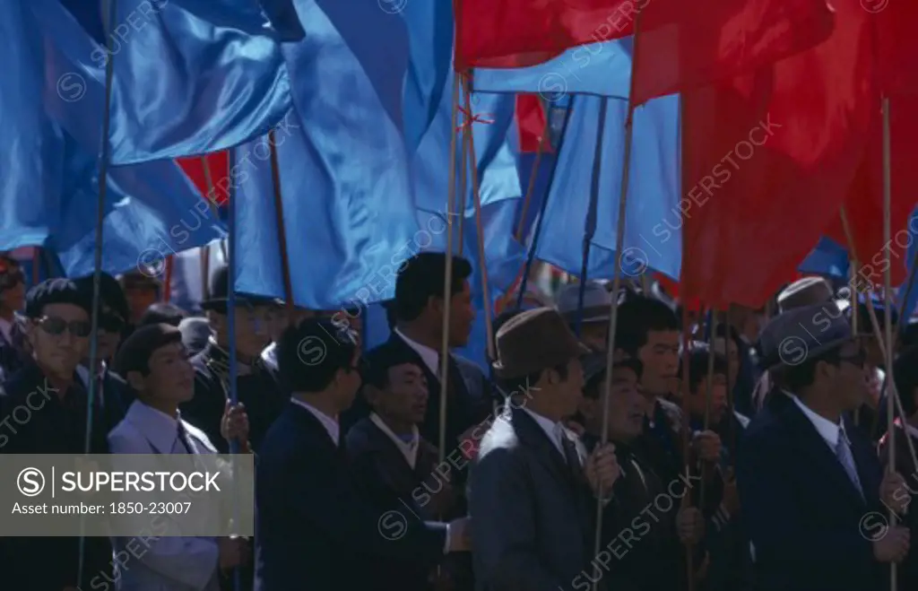 Mongolia, Ulan Bator, 'Nadam  National Day Parade Of Workers And Party Members Carrying Red And Blue Banners, The Two Prime National Colours.  Ulaan Baatar  Soviet Mongolia East Asia Asian Baator Male Man Guy Mongol Uls Mongolian '