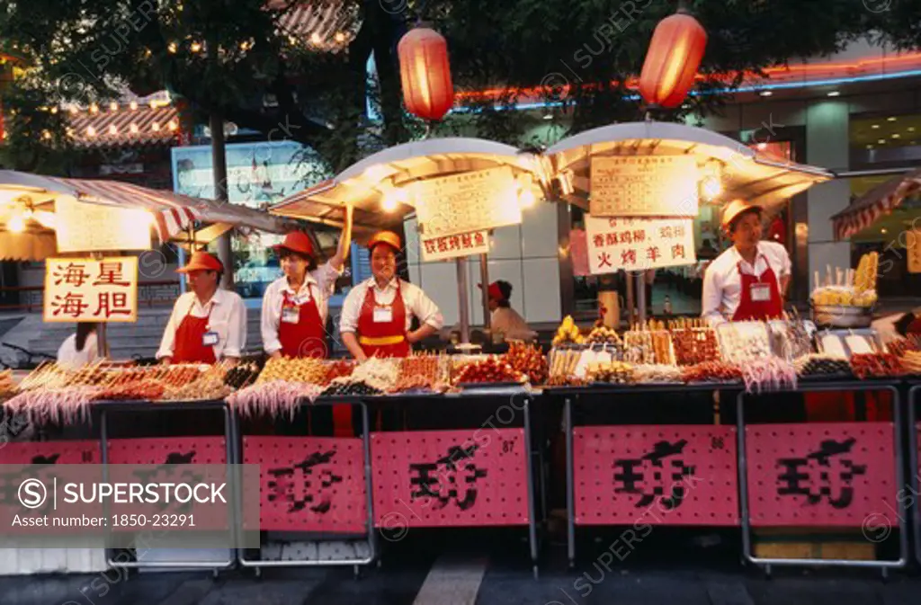 China, Beijing, Food Stalls In Donghua Yeshi Night Market With Chinese Lanterns Hanging Above.
