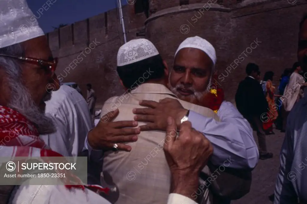 Pakistan, Punjab, Lahore, Devout Muslims Saying Their Goodbyes Before Departing On Pilgrimage To Mecca.