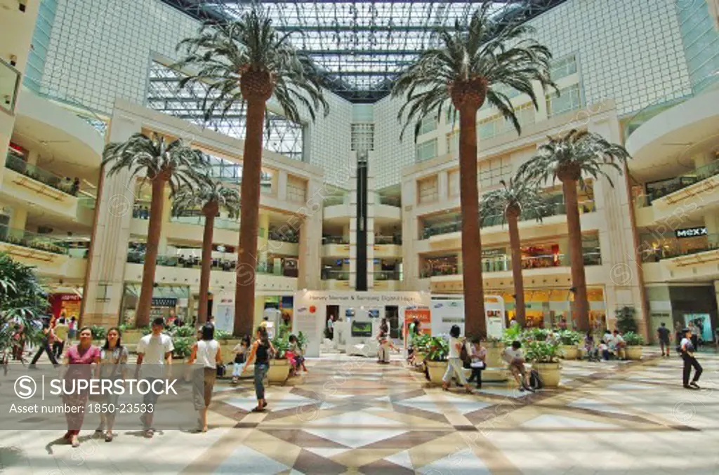 Singapore, Civic District , Raffles City, 'Interior View Of The Raffles City Shopping Mall .Raffles City Shopping Mall Is A Large Complex Located In The Civic District Within The Downtown Core Of The City-State Of Singapore. Occupying An Entire City Block Bounded By Stamford Road, Beach Road, Bras Basah Road And North Bridge Road, It Houses Two Hotels And An Office Tower Over A Podium Which Contains A Shopping Mall And A Convention Centre'