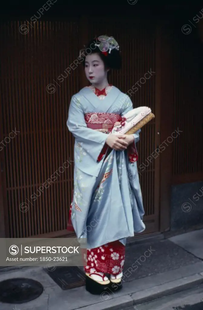 Japan, Honshu, Kyoto, 'Someiyu, A Maiko Or Apprentice Geisha Standing In The Doorway Of A Geisha House In The Gion District.  Her Client Will Pay Nearly 100 For The Pleasure Of Her Company. '