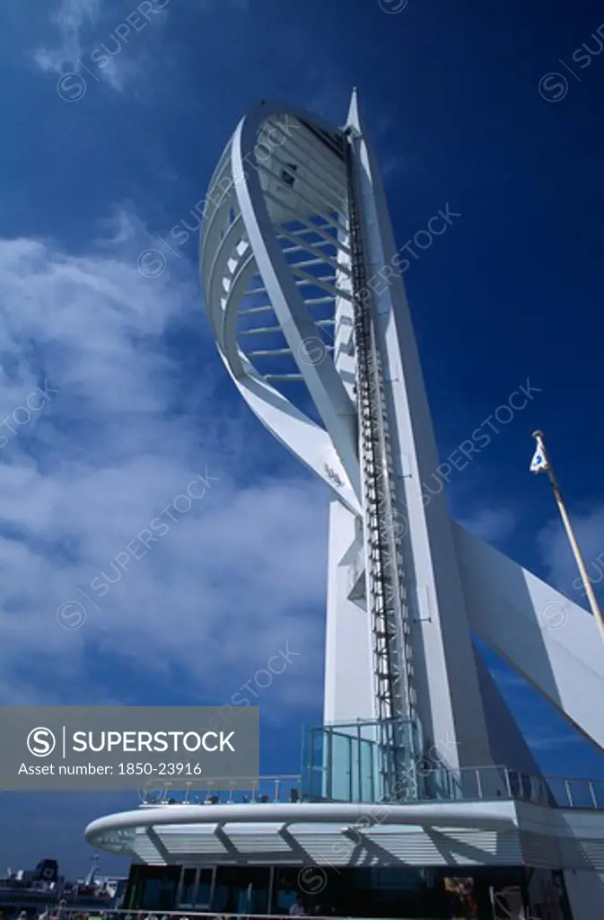 England, Hampshire, Portsmouth, Gunwharf Keys. The Spinnaker Tower Seen Against A Blue Sky. Standing 170 Metres (557 Feet) Above The Harbour Of Portsmouth.