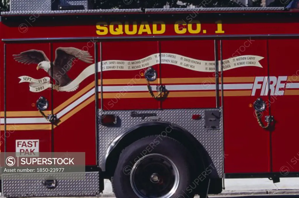 Usa, New York, New York City, Part View Of Fire Engine Painted With Bald Eagle Carrying Banner Listing Some Of The New York Fire Officers Killed In The September 11Th 2001 World Trade Tower Attack.