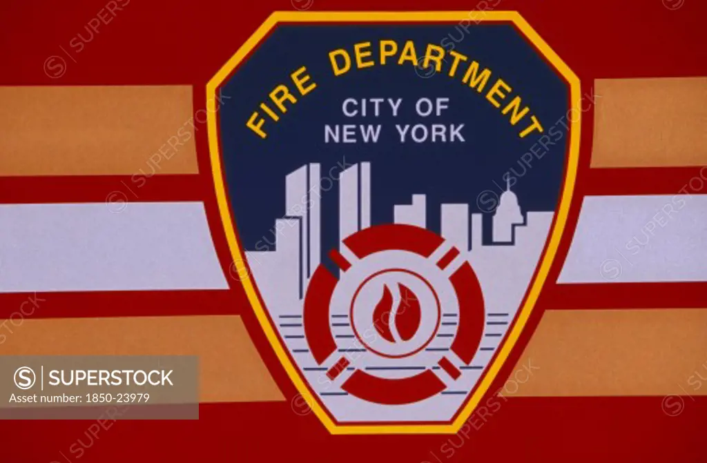 Usa, New York, New York City, Detail Of New York Fire Department Badge On Side Of Fire Engine Or Truck.  Continues To Depict City Skyline Including Twin Towers Of The World Trade Centre.