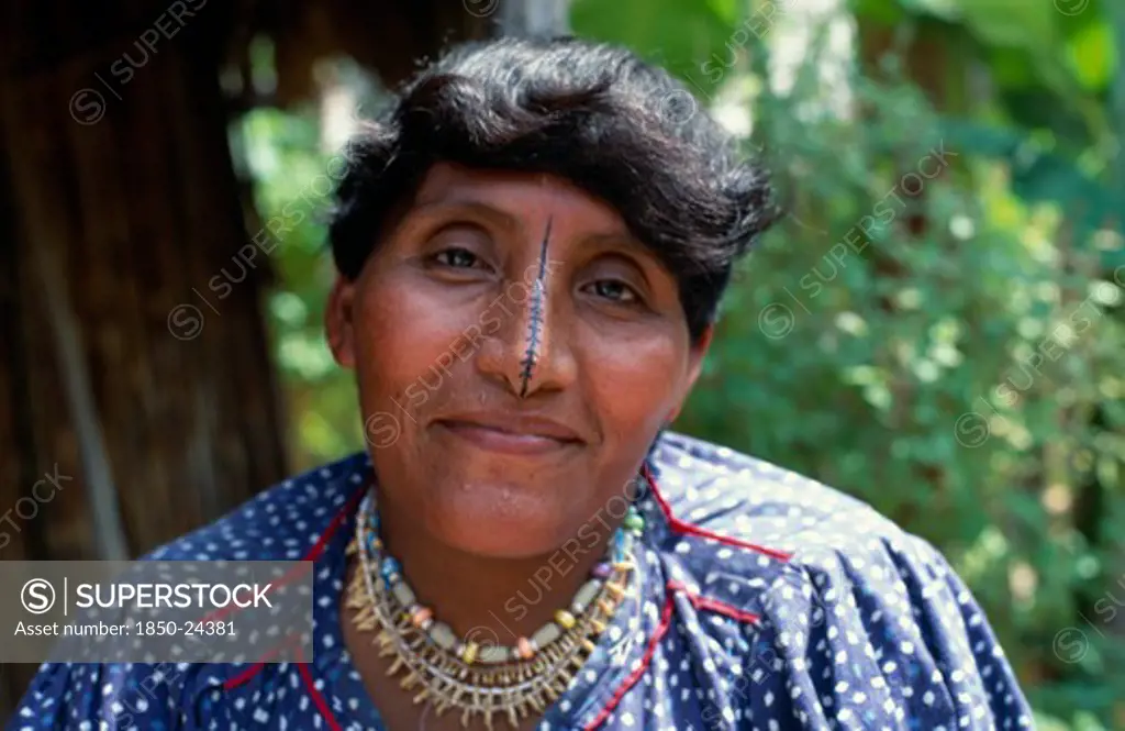 Panama, San Blas Islands Tikantiki , Kuna Indigenous Tribe, 'Portrait Of An Older Kuna Woman, The Wife Of The Island Chieftain, Wearing A Monkey Tooth Necklace With A Black Line Drawn Along Length Of Nose.  Cuna'