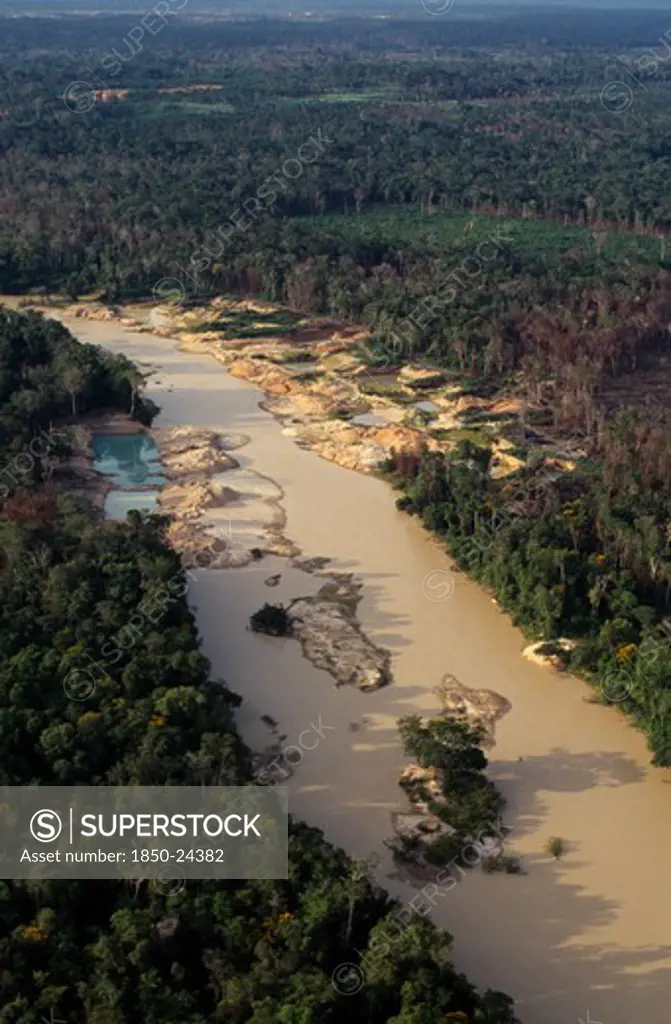 Brazil, Matto Grosso, Peixoto De Azevedo, Aerial View Over Peixoto River.Now A Garimpo  Gold Mine On Former Panara Territory  Showing Gold-Workings  Deforestation And Pollution From Mercury.