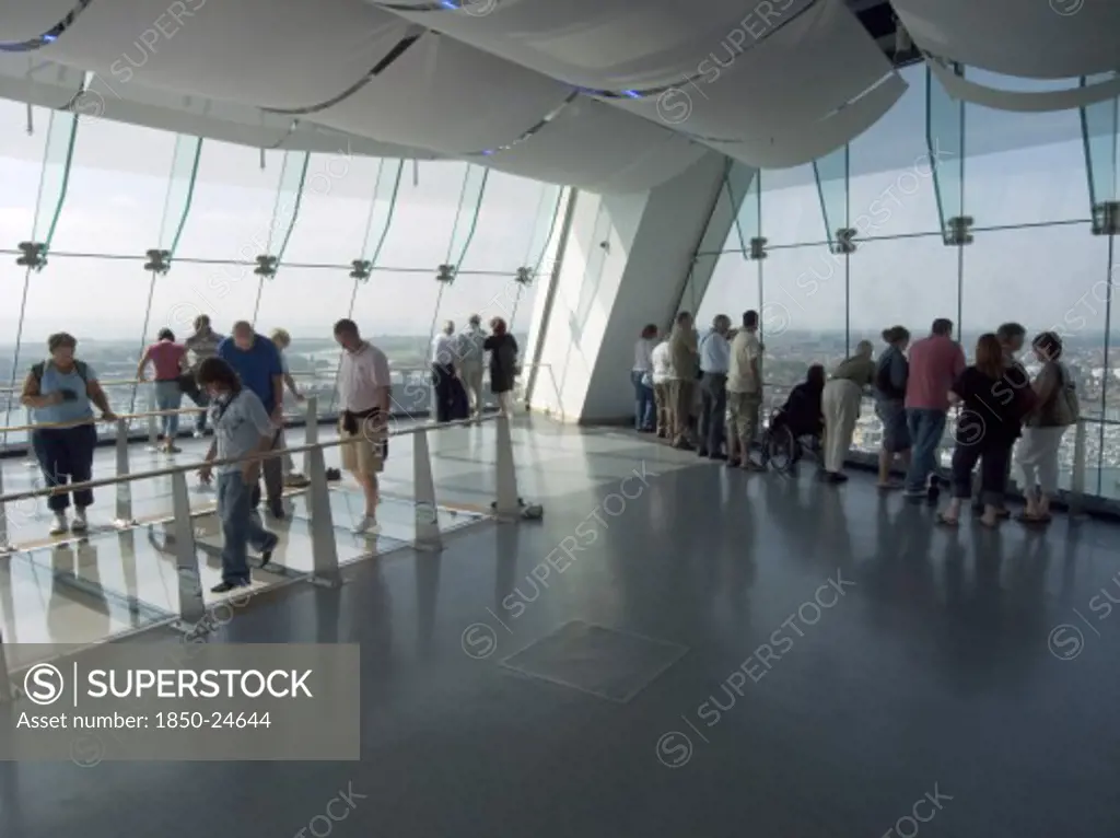 England, Hampshire, Portsmouth, 'Gunwharf Quays. The Spinnaker Tower. Interior View With Visitors Looking Out Of Glass Windows On The Top Observation Deck, Providing A 320 View Of The City Of Portsmouth, The Langstone And Portsmouth Harbours, And A Viewing Distance Of 37 Kilometres (23 Miles)'