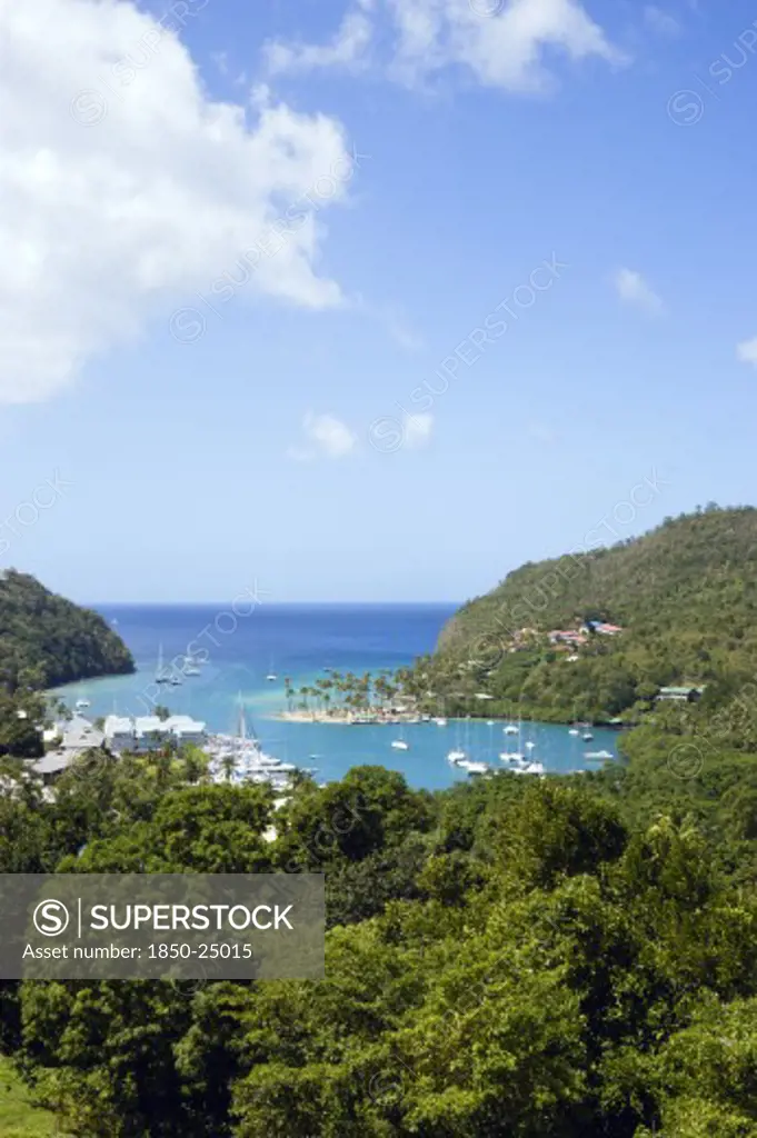 West Indies, St Lucia, Castries , Marigot Bay The Harbour With Yachts At Anchor The And Lush Surrounding Valley
