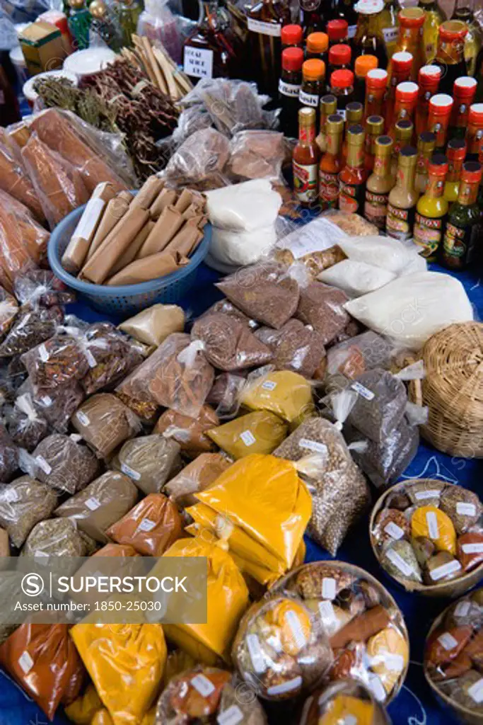 West Indies, St Lucia, Castries, 'Market Stall With Packets Of Locally Produced Herbs, Spices And Bottles Of Sauces'