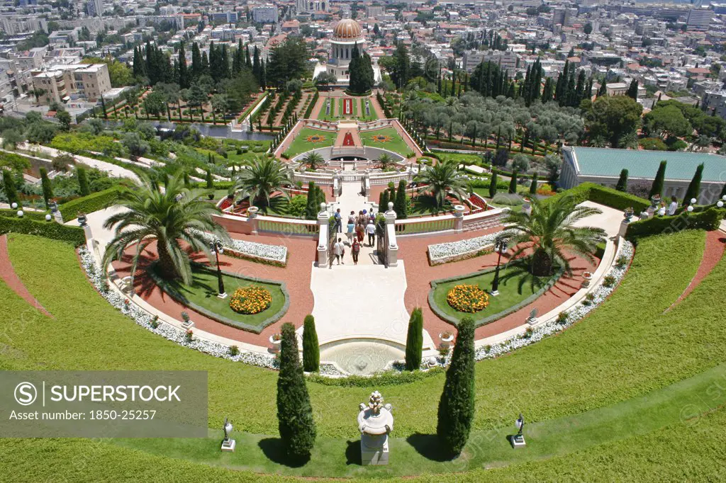 Israel, Northern Coast, Haifa, 'Zionism Avenue.  View Of Baha'I Shrine And Gardens Built As Memorial To Founders Of The BahAi Faith.  Formal Layout Of Flowerbeds And Pathways With Cypress Trees, Central Domed Shrine And City Beyond.'