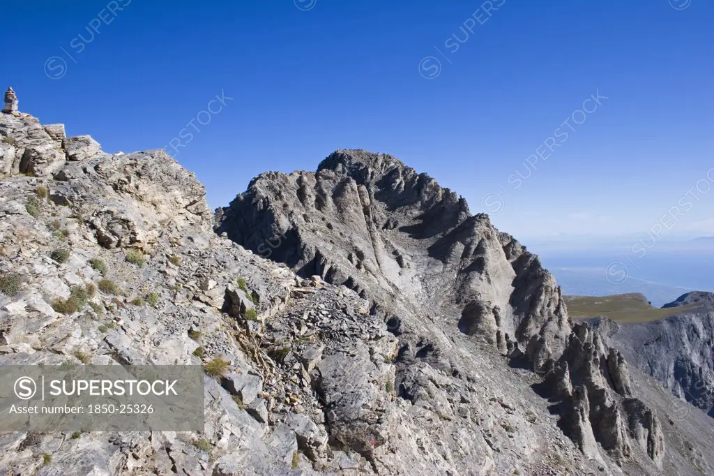 Greece, Macedonia, Pieria, 'View Of  Highest Peak Of Mount Olympus Called Mytikas.  Eroded Rocks And Scree Against Blue, Cloudless Sky.'