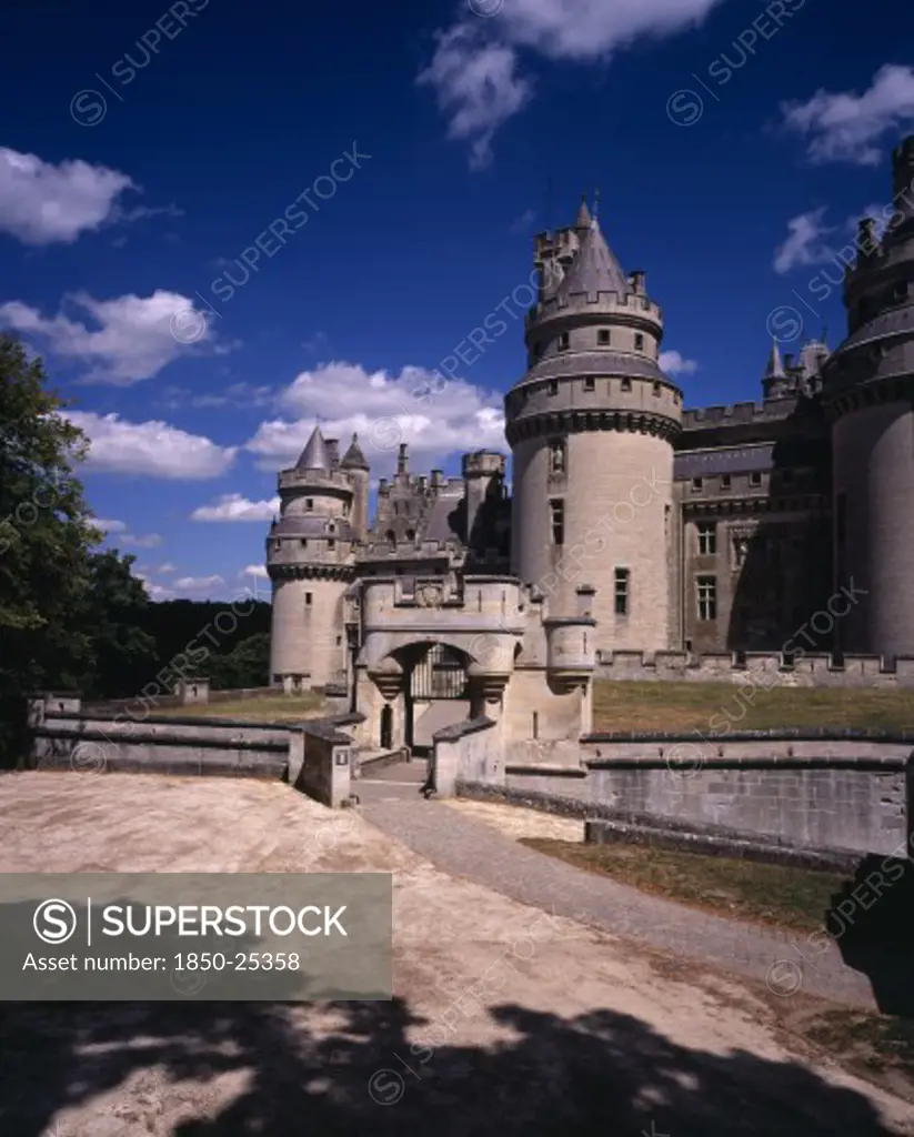 France, Picardie, Oise, 'Chateau De Pierrefonds, Dating From 14Th C.  Restored  By Viollet-Le-Duc From 1857 On The Orders Of Napoleon Iii.  Exterior With Crenellated Walls And Turrets. Used As Set For Bbc Merlin Series.'
