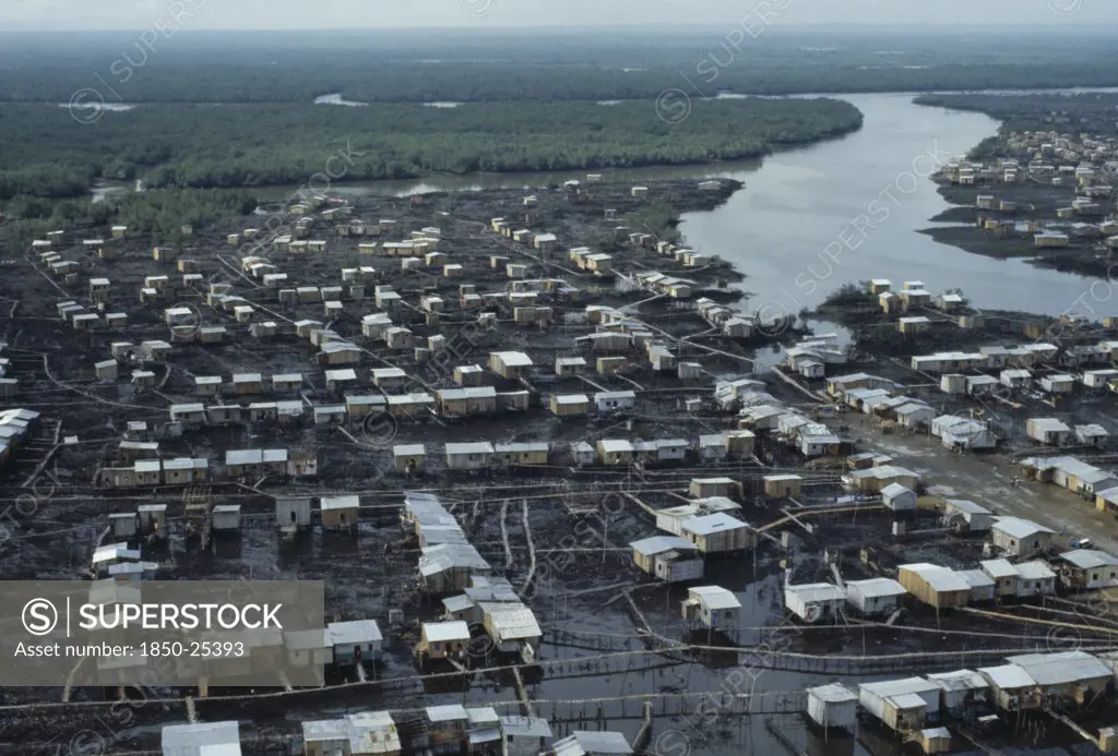 Ecuador, Guayas Province, Guayaquil , Aerial View Over Slum Housing With Stilt Buildings Built Over Untreated Sewage