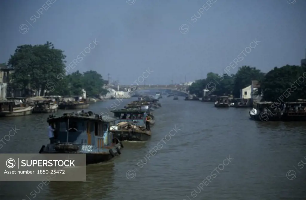 China, Jiangsu Province, Transport, Barge Train Travelling Down The Grand Canal Between Suzhou And Wuxi.
