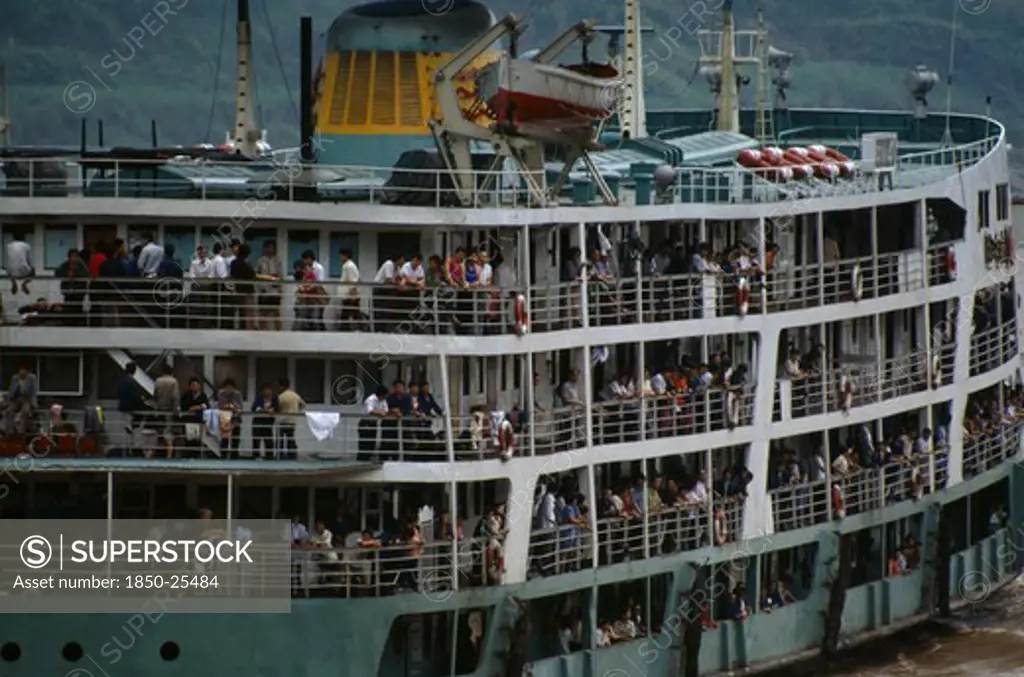 China, Hubei, Transport, Ferry On The River Yangtsi With People Crowded On The Deck