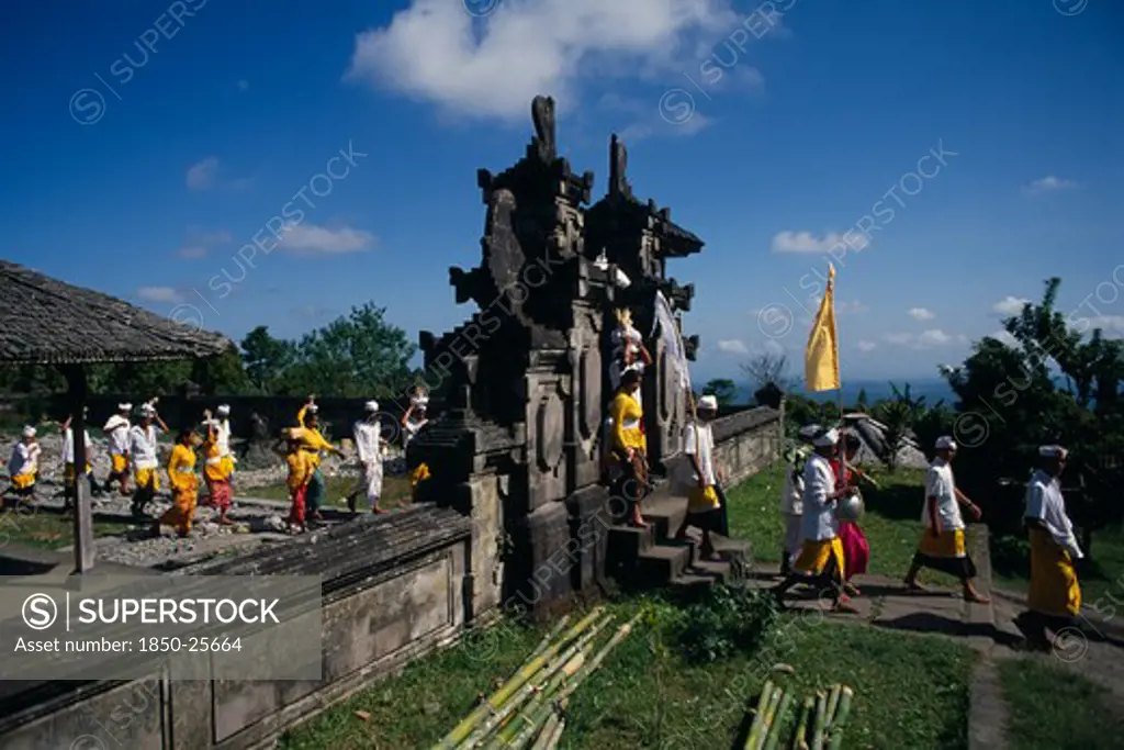 Indonesia, Bali, Besakih Temple, Procession Of Mourners Leaving Cremation Ceremony In Temple Grounds. Besakih Temple Is Situated On Mount Agung And Known As The Mother Temple Of Bali.