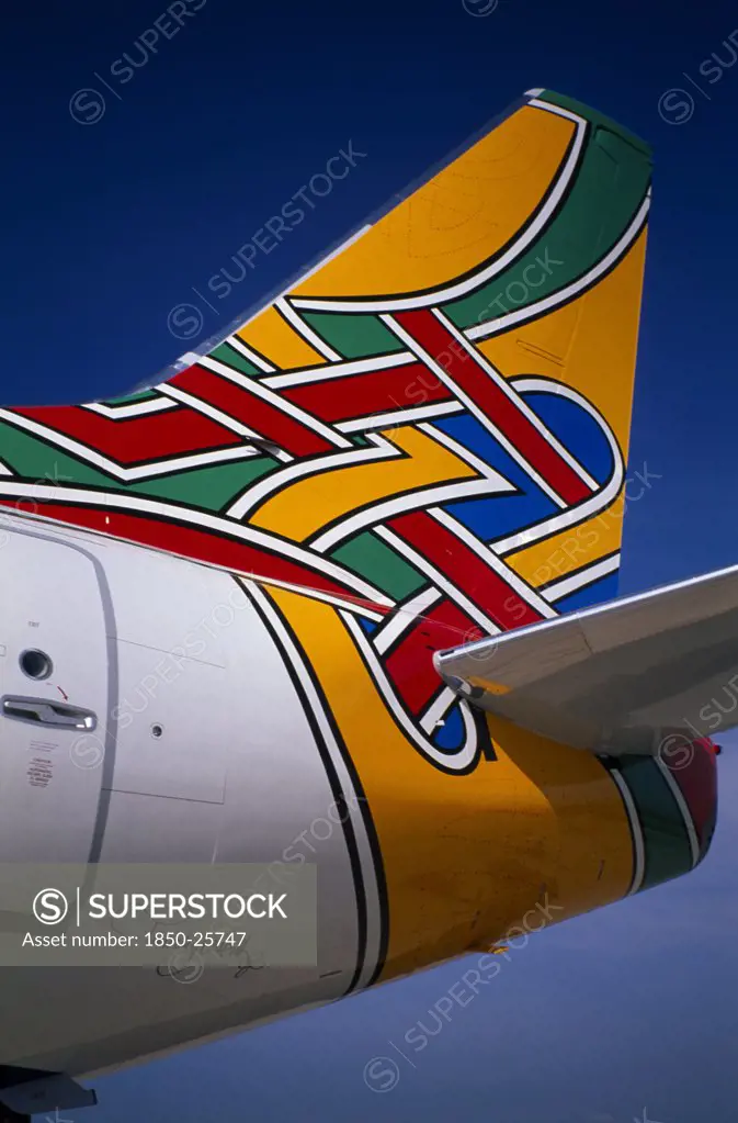 Transport, Air, Plane Detail, Boeing 737 At Gatwick Airport Operated By British Airways. Detail Of Tail Design By Artist Tim ONeil From Dublin Ireland Entitled Colum Meaning Dove In Irish