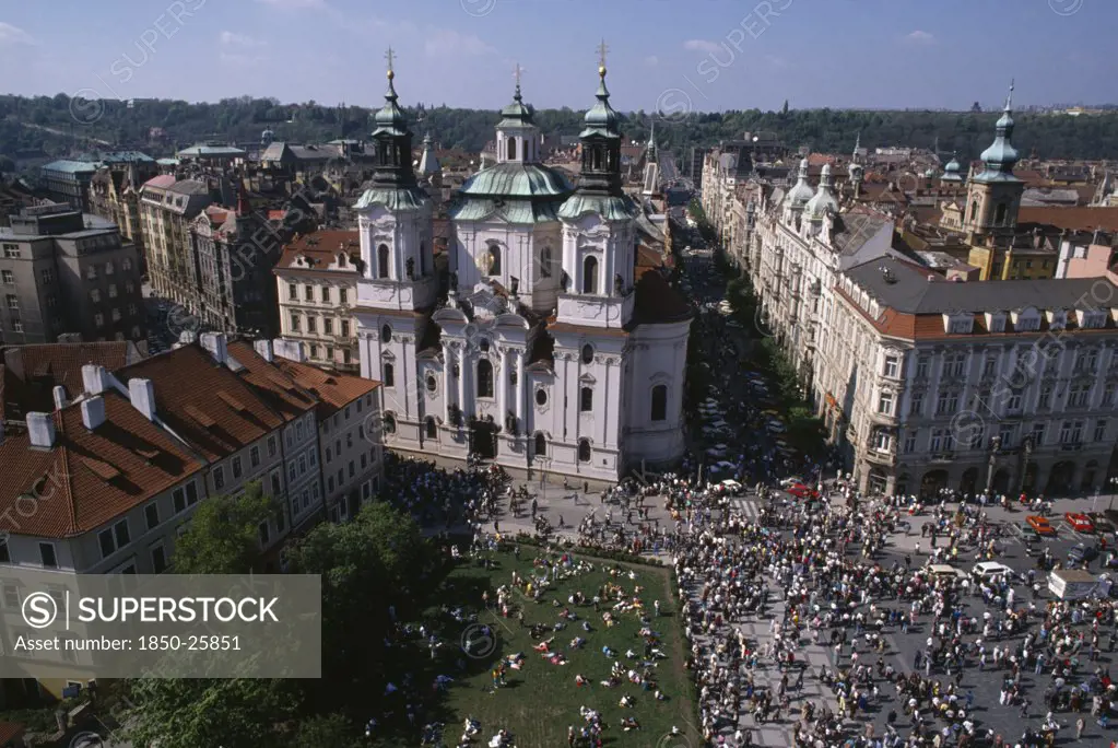 Czech Republic, Prague, Elevated View Over Old Town Square Crowds And Surrounding Architecture.