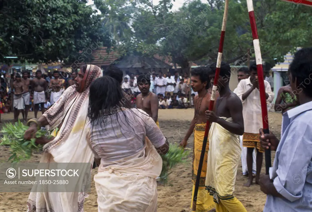 Sri Lanka, Religion, Hinduism, Punnaccolai Festival. Priest And Woman In A State Of Trance Watched By Onlookers