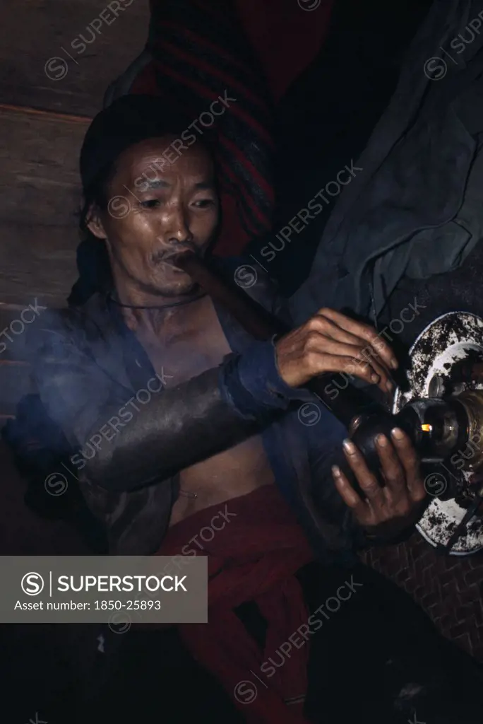 Laos, Tribal People, Meo Tribe, Meo Man Smoking Opium