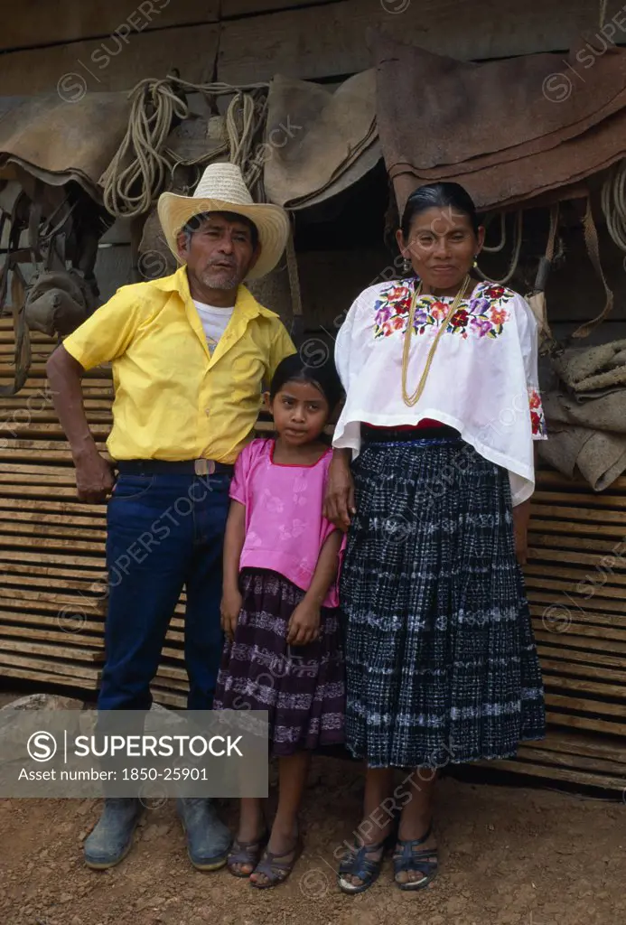 Guatemala, Tribal People, QEqchi, 'Full Lengh Standing Portrait Of A QEqchi Indian Family, A Rich Land Owner With His Wife And Daughter'