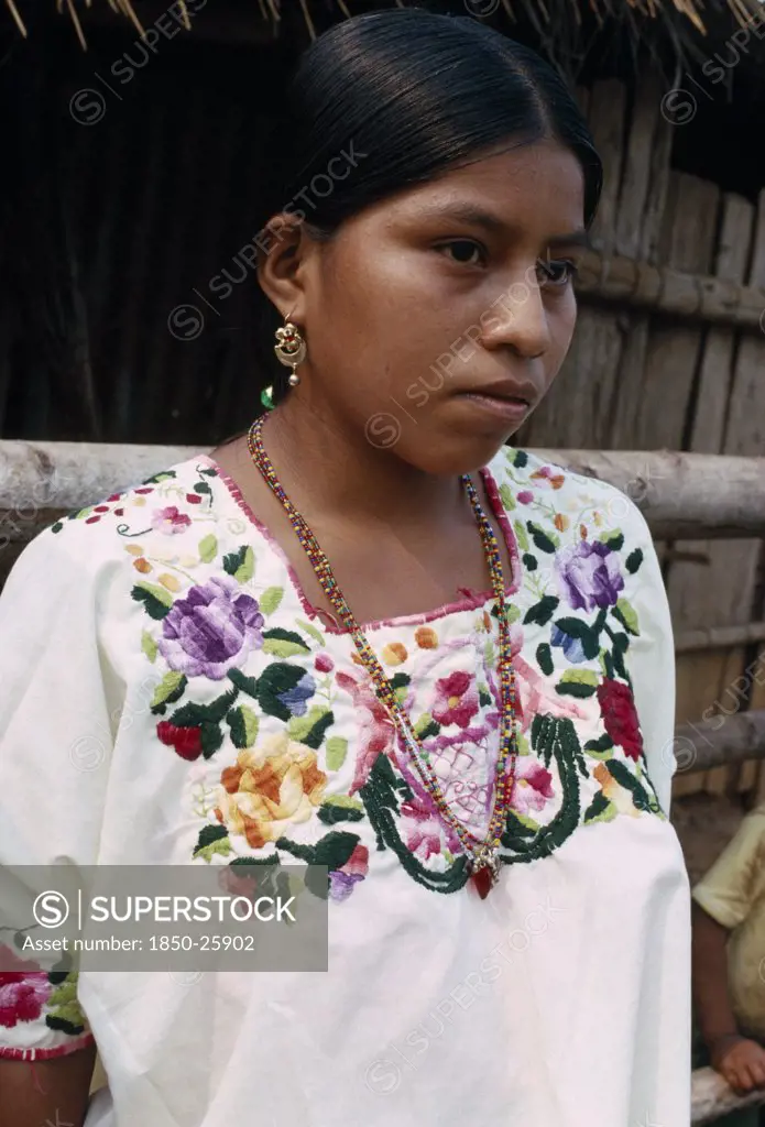 Guatemala, Alta Verapaz, Semuy, Portrait Of A QEqchi Indian Girl Wearing A Hand Embroidered Blouse