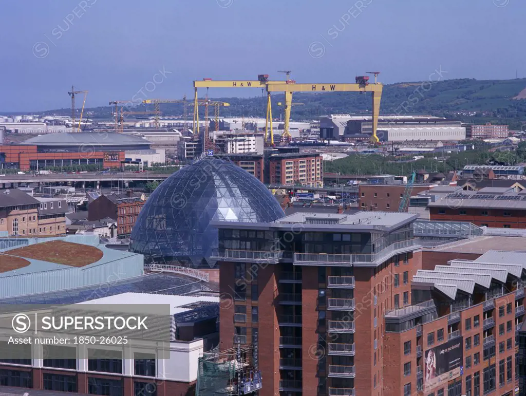 Ireland, North, Belfast, Cityscape With Victoria Square Shopping Centre Dome And Cranes Seen From The Belfast Wheel At City Hall.